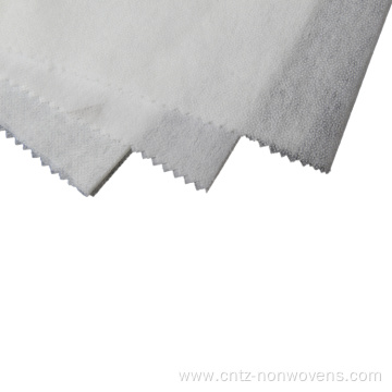 shrink-resistant adhesive fusible nonwoven interlining